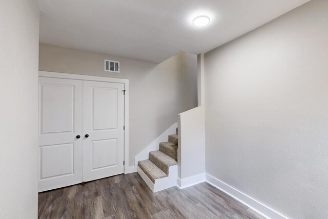 1500 W Collin, Corsicana, TX 75110 - staircase featuring wood finished floors and baseboards