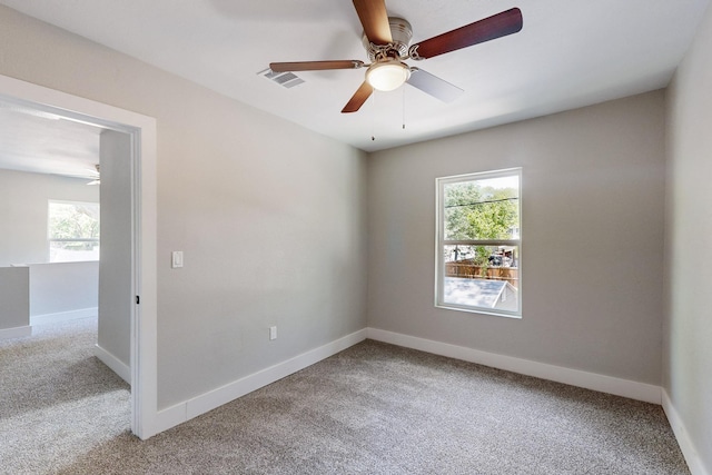 1500 W Collin, Corsicana, TX 75110 - spare room with carpet flooring, healthy amount of natural light, and a ceiling fan