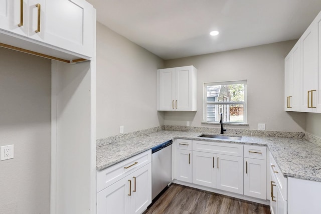 1500 W Collin, Corsicana, TX 75110 - kitchen featuring a sink, dishwasher, dark wood finished floors, white cabinets, and recessed lighting
