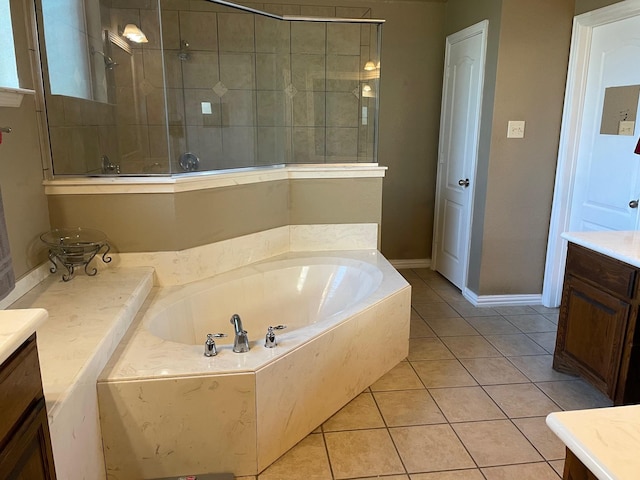 125 Rattling Antler Ct, Azle, TX 76020 - bathroom with a garden tub, tile patterned floors, a tile shower, and vanity