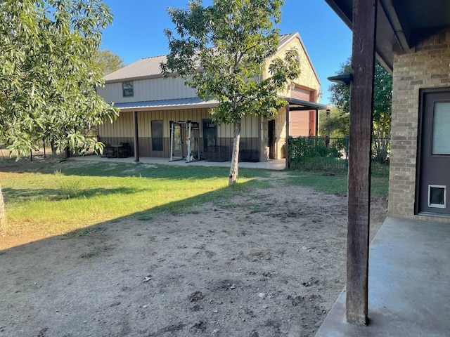 125 Rattling Antler Ct, Azle, TX 76020 - exterior space featuring a patio, a yard, and metal roof