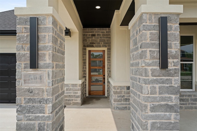 view of exterior entry with stone siding
