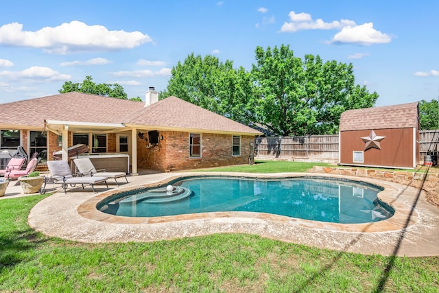 view of swimming pool featuring a patio area, a hot tub, an outdoor structure, and a storage shed