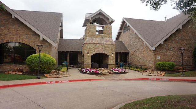 4724 Shelley Dr, Flower Mound, TX 75022 - exterior space featuring a shingled roof, brick siding, and stone siding