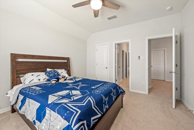 ensuite bathroom featuring vanity, tile patterned floors, baseboards, and a ceiling fan