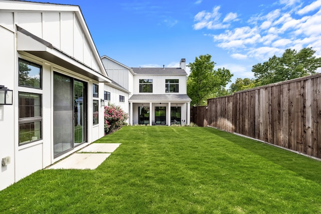 view of yard featuring a fenced backyard