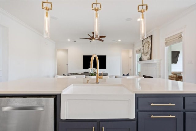kitchen featuring a sink, light countertops, open floor plan, dishwasher, and a ceiling fan