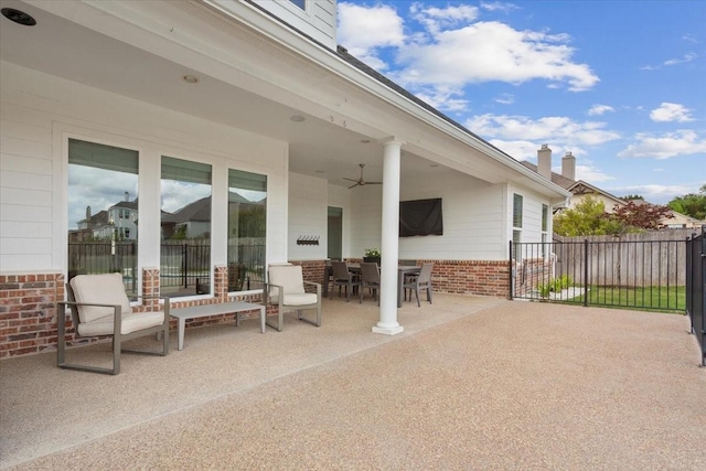 view of patio / terrace featuring a ceiling fan, outdoor dining area, and fence