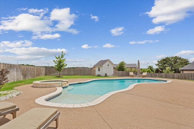 view of swimming pool featuring a pool with connected hot tub, an outdoor structure, a patio, and a fenced backyard