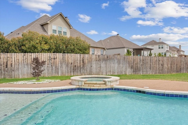 view of pool with fence, an in ground hot tub, and a fenced in pool