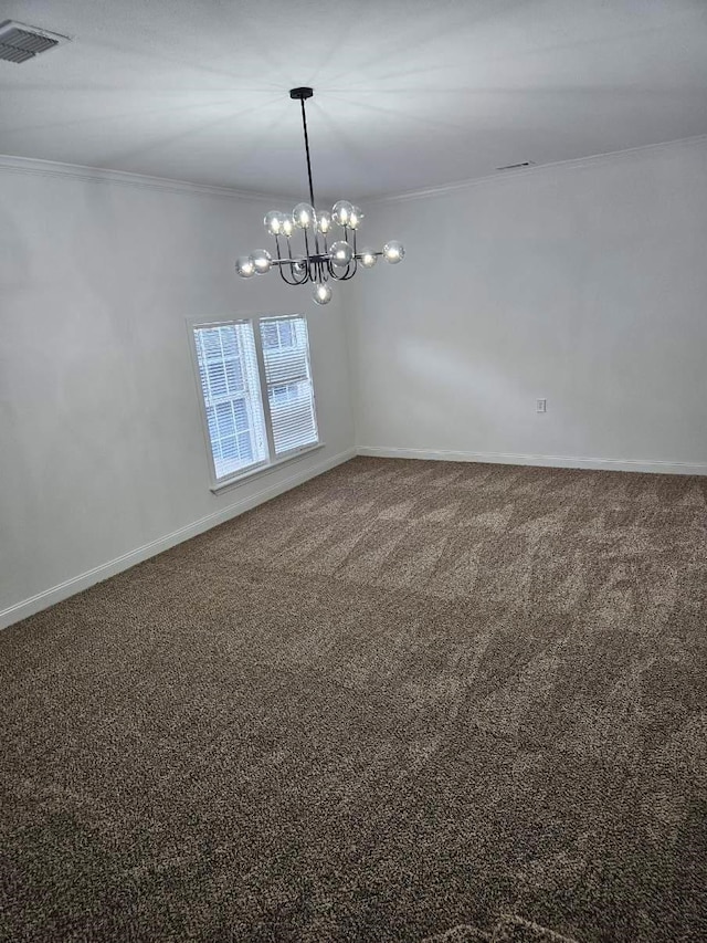 carpeted empty room with baseboards, ornamental molding, visible vents, and a chandelier