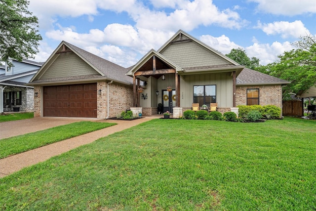 craftsman inspired home featuring a garage, brick siding, a front lawn, and concrete driveway