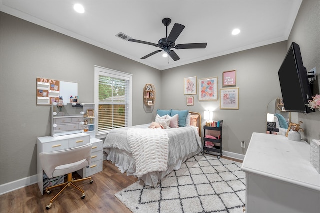 bedroom featuring visible vents, crown molding, light wood finished floors, and recessed lighting