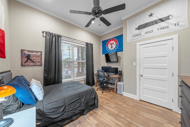bedroom with crown molding, ceiling fan, baseboards, and light wood-type flooring