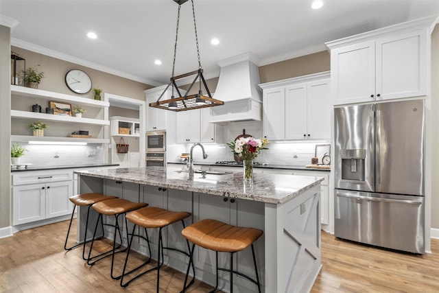 kitchen featuring tasteful backsplash, open shelves, a sink, appliances with stainless steel finishes, and custom exhaust hood