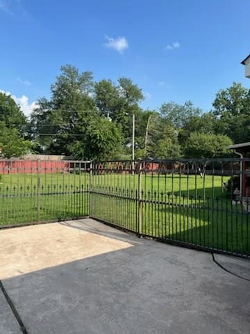 7 Carl Lee Cir, Terrell, TX 75160 - gate with view of wooded area