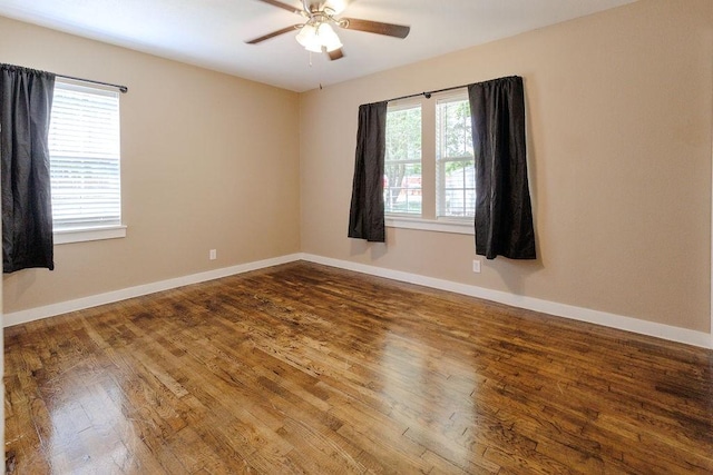 102 S Oak St, Paradise, TX 76073 - empty room featuring wood finished floors and a ceiling fan