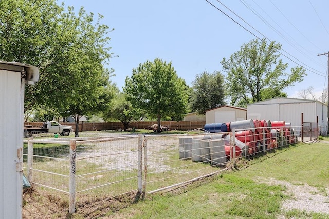 102 S Oak St, Paradise, TX 76073 - view of yard with a garage and an outdoor structure