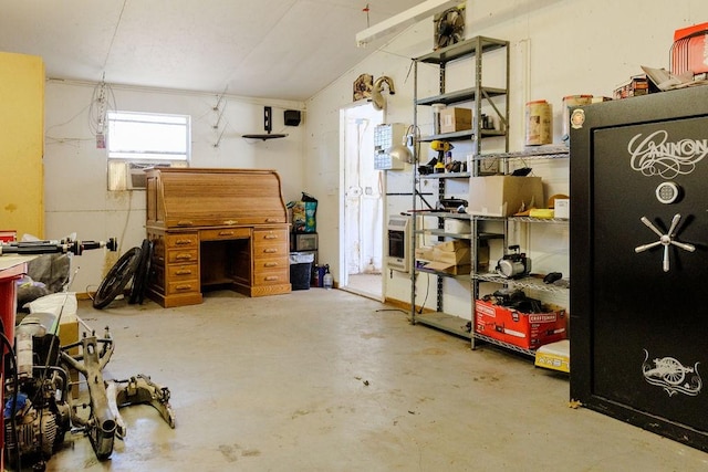 102 S Oak St, Paradise, TX 76073 - miscellaneous room with unfinished concrete flooring, cooling unit, and lofted ceiling
