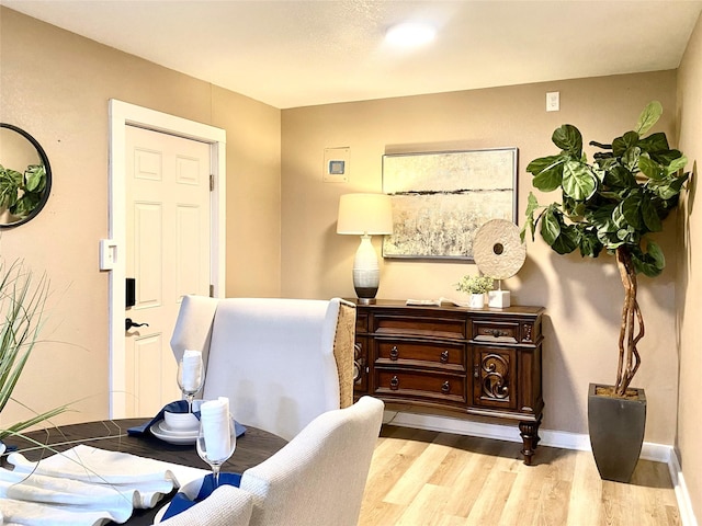 102 S Oak St, Paradise, TX 76073 - living area featuring wood finished floors and baseboards