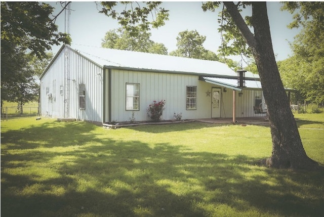 view of outdoor structure featuring fence