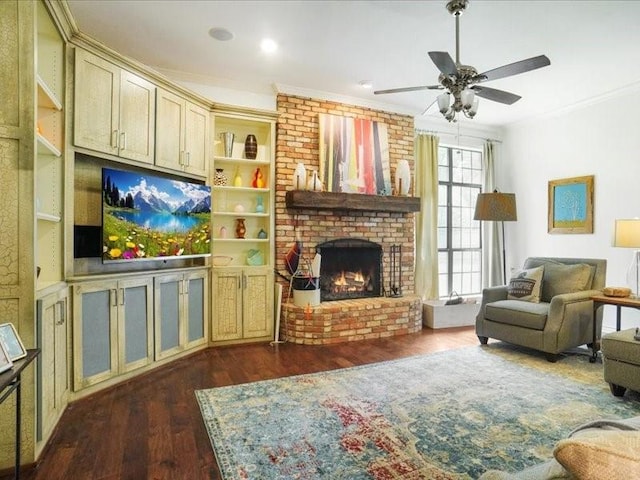 1428 Oxford Ln, Denton, TX 76209 - living area featuring dark wood-style flooring, ceiling fan, ornamental molding, and a fireplace