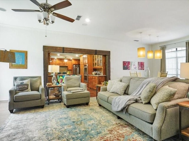 1428 Oxford Ln, Denton, TX 76209 - living room with visible vents and a ceiling fan