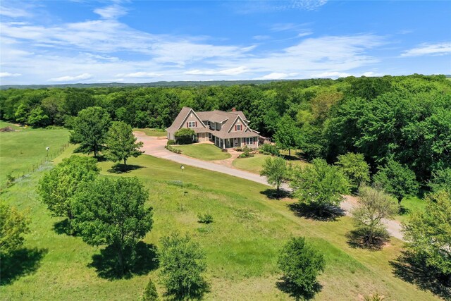 aerial view featuring a forest view