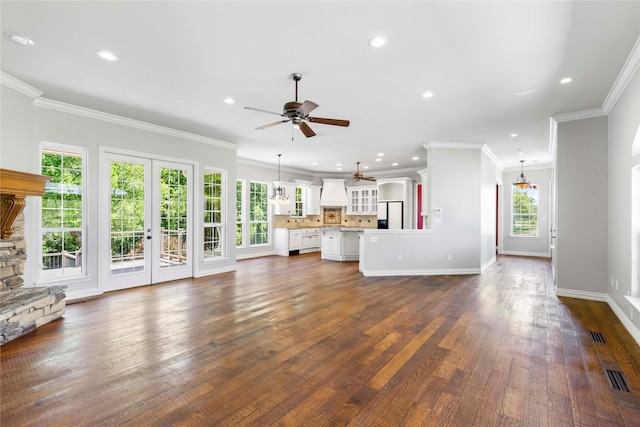 unfurnished living room with visible vents, baseboards, recessed lighting, dark wood-type flooring, and a ceiling fan