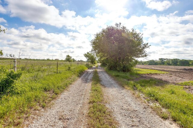 view of street featuring a rural view