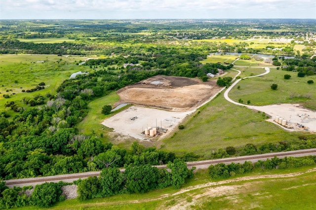 birds eye view of property featuring a rural view