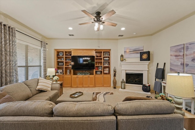 8405 Moore St, Frisco, TX 75034 - living area with crown molding, a fireplace with raised hearth, ceiling fan, and visible vents
