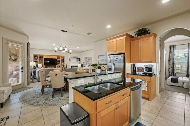 8405 Moore St, Frisco, TX 75034 - kitchen featuring a sink, stainless steel appliances, light tile patterned flooring, and open floor plan