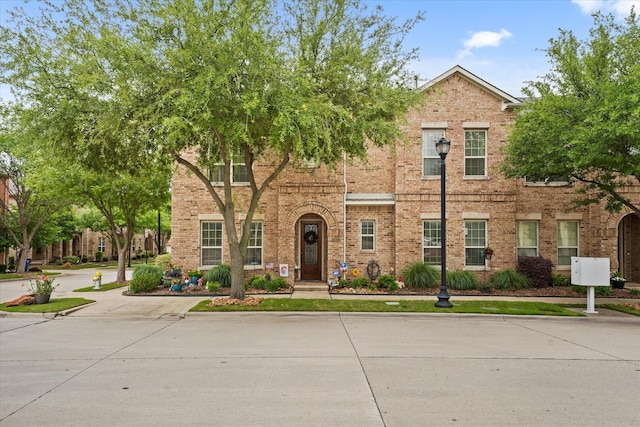 8405 Moore St, Frisco, TX 75034 - view of front facade with brick siding