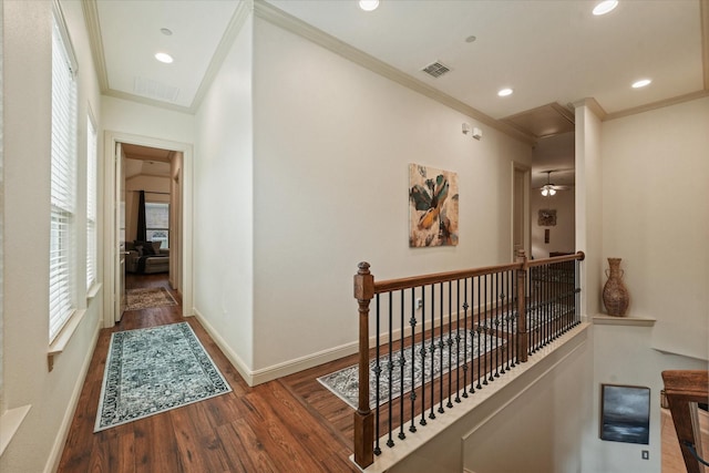 8405 Moore St, Frisco, TX 75034 - hallway with an upstairs landing, ornamental molding, wood finished floors, and visible vents