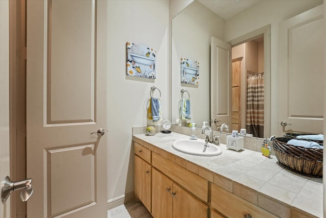 8405 Moore St, Frisco, TX 75034 - bathroom with vanity and a shower with shower curtain
