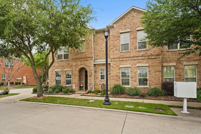 8405 Moore St, Frisco, TX 75034 - traditional home featuring fence, an attached garage, driveway, and brick siding
