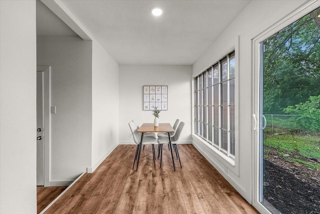 5409 Mallory Dr, Haltom City, TX 76117 - dining area featuring wood finished floors and baseboards