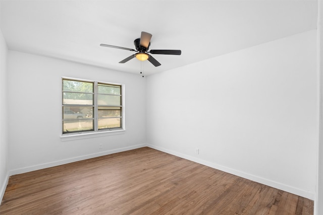 5409 Mallory Dr, Haltom City, TX 76117 - unfurnished room featuring baseboards, wood finished floors, and ceiling fan