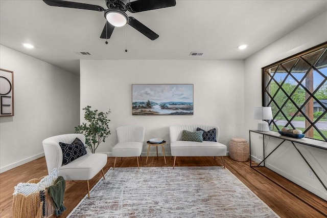 5409 Mallory Dr, Haltom City, TX 76117 - living area with visible vents, wood finished floors, and baseboards