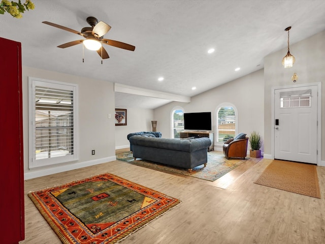 living room with wood finished floors, a ceiling fan, recessed lighting, and baseboards