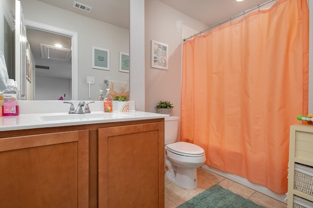 bathroom with tile patterned flooring, a shower with curtain, toilet, vanity, and visible vents
