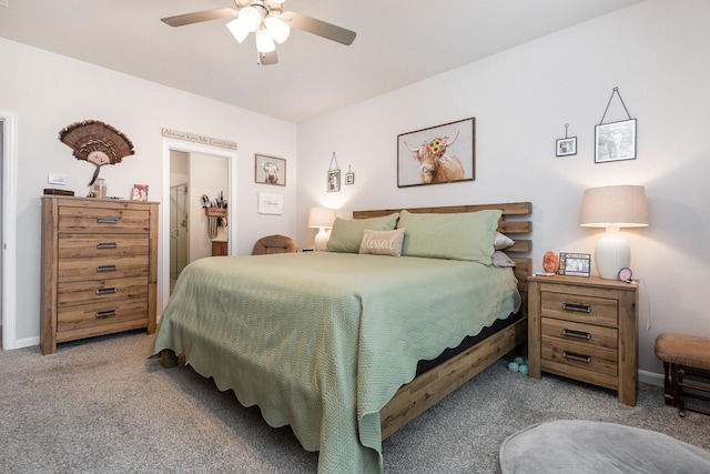bedroom with a ceiling fan and carpet