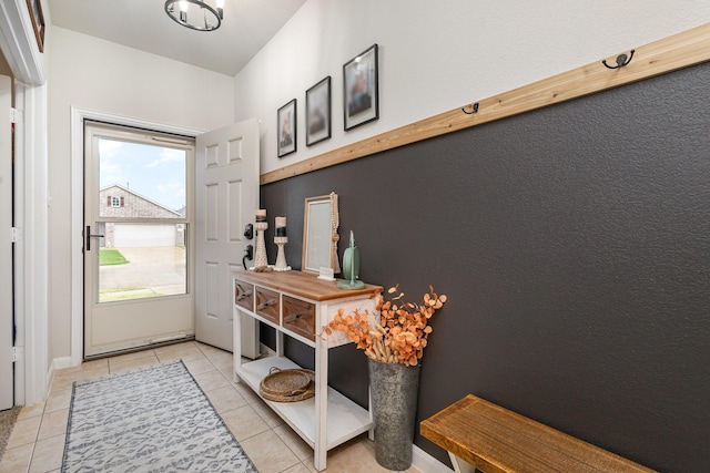 entryway featuring light tile patterned floors