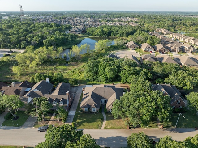 bird's eye view with a residential view and a water view