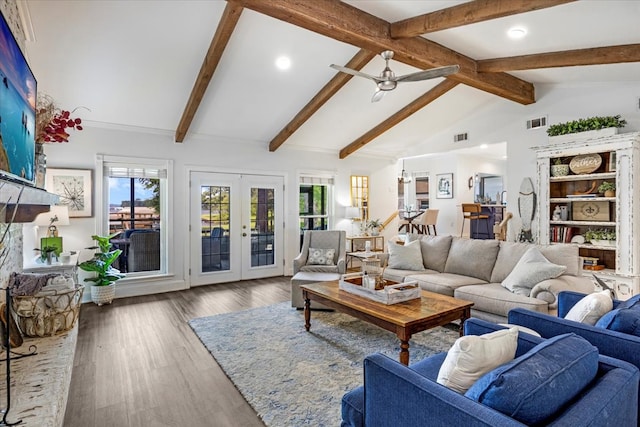 living area featuring visible vents, vaulted ceiling with beams, ceiling fan, and french doors