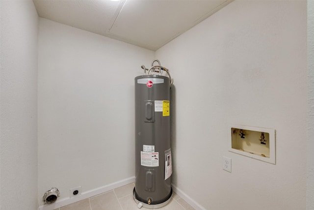 utility room featuring electric water heater