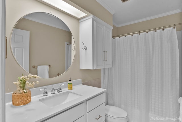 bathroom featuring toilet, crown molding, vanity, and a shower with shower curtain