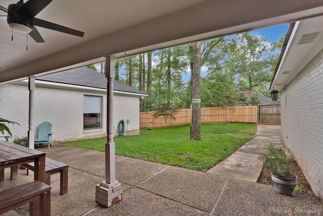view of patio / terrace featuring ceiling fan