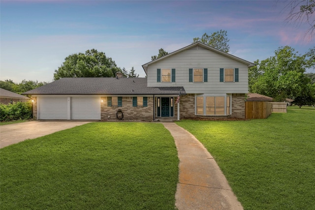 2820 Bois D Arc St, Commerce, TX 75428 - traditional-style home featuring concrete driveway, a front lawn, an attached garage, and a chimney